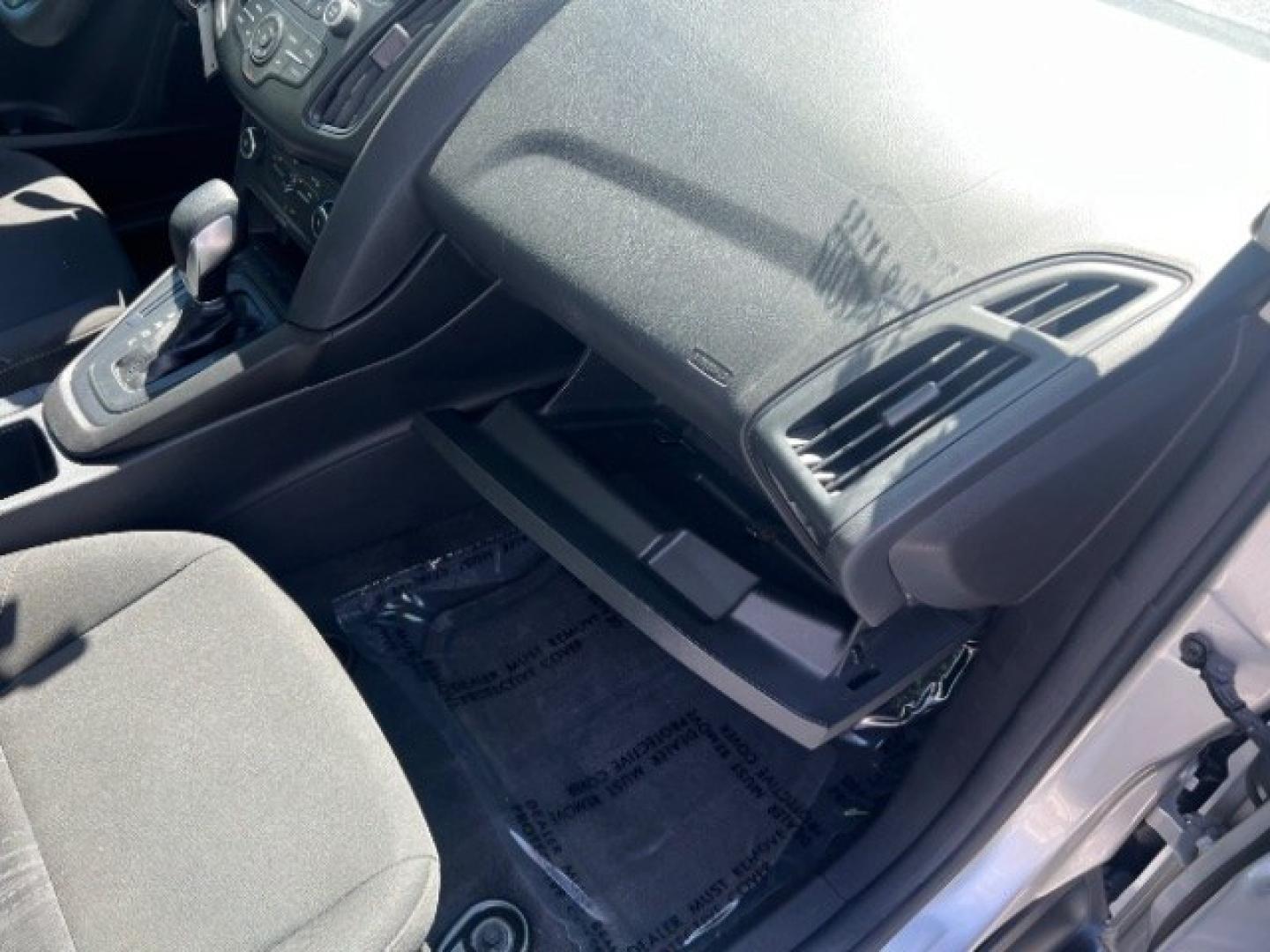 2017 Ingot Silver Metallic /Charcoal Black Ford Focus S (1FADP3E29HL) with an 2L I-4 gasoline direct injection engine, Automatic transmission, located at 940 North Main Street, Cedar City, UT, 84720, (435) 628-0023, 37.692936, -113.061897 - We specialize in helping ALL people get the best financing available. No matter your credit score, good, bad or none we can get you an amazing rate. Had a bankruptcy, divorce, or repossessions? We give you the green light to get your credit back on the road. Low down and affordable payments that fit- Photo#27