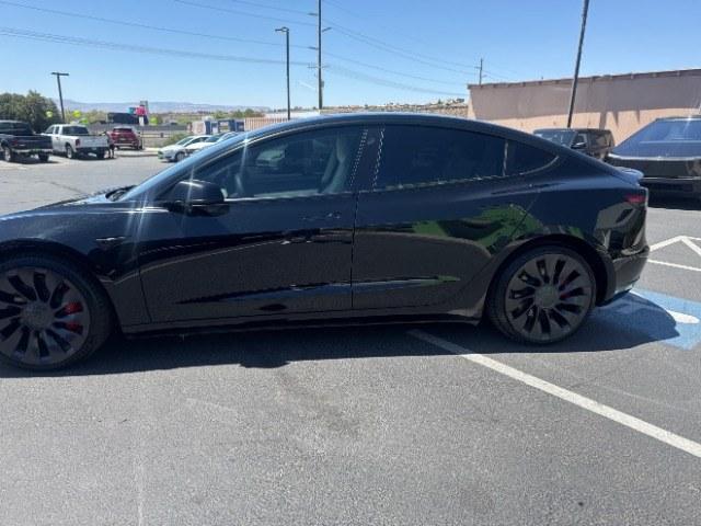 2021 Black /White Leather Tesla Model 3 Performance (5YJ3E1ECXMF) with an ELECTRIC engine, 1-Speed Automatic transmission, located at 1865 East Red Hills Pkwy, St. George, 84770, (435) 628-0023, 37.120850, -113.543640 - Excellent Tesla Model 3 Long Range All Wheel Drive Performance with FSD PAID FOR ($8k Full Self Driving Subscription fully transfers to new owner. Lock in FSD for life! 5 Seats HW3, Black and White Premium Interior and exterior in great condition. Every Tesla we sell has had cabin air filter replac- Photo#4