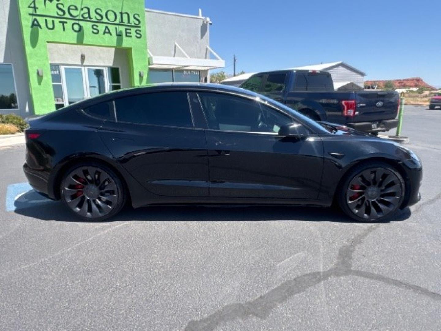 2021 Black /White Leather Tesla Model 3 Performance (5YJ3E1ECXMF) with an ELECTRIC engine, 1-Speed Automatic transmission, located at 1865 East Red Hills Pkwy, St. George, 84770, (435) 628-0023, 37.120850, -113.543640 - Excellent Tesla Model 3 Long Range All Wheel Drive Performance with FSD PAID FOR ($8k Full Self Driving Subscription fully transfers to new owner. Lock in FSD for life! 5 Seats HW3, Black and White Premium Interior and exterior in great condition. Every Tesla we sell has had cabin air filter replac- Photo#8