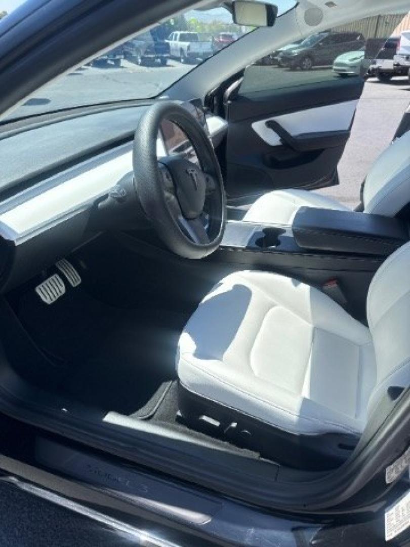 2021 Black /White Leather Tesla Model 3 Performance (5YJ3E1ECXMF) with an ELECTRIC engine, 1-Speed Automatic transmission, located at 1865 East Red Hills Pkwy, St. George, 84770, (435) 628-0023, 37.120850, -113.543640 - Excellent Tesla Model 3 Long Range All Wheel Drive Performance with FSD PAID FOR ($8k Full Self Driving Subscription fully transfers to new owner. Lock in FSD for life! 5 Seats HW3, Black and White Premium Interior and exterior in great condition. Every Tesla we sell has had cabin air filter replac- Photo#13