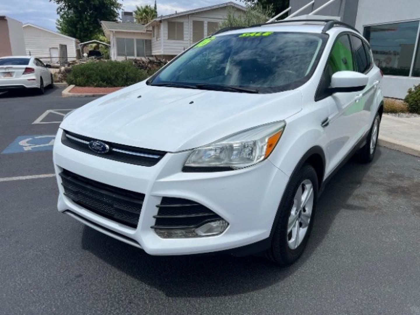 2016 Oxford White /Charcoal Black Ford Escape SE (1FMCU9GX3GU) , Automatic transmission, located at 1865 East Red Hills Pkwy, St. George, 84770, (435) 628-0023, 37.120850, -113.543640 - We specialize in helping ALL people get the best financing available. No matter your credit score, good, bad or none we can get you an amazing rate. Had a bankruptcy, divorce, or repossessions? We give you the green light to get your credit back on the road. Low down and affordable payments that fit- Photo#2