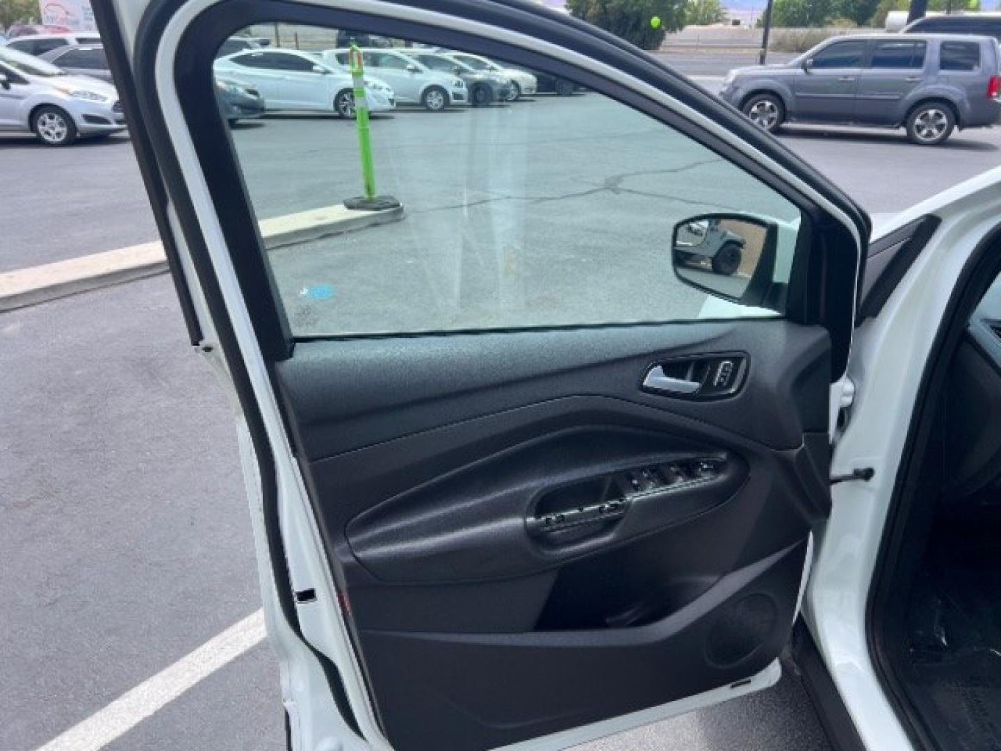 2016 Oxford White /Charcoal Black Ford Escape SE (1FMCU9GX3GU) , Automatic transmission, located at 1865 East Red Hills Pkwy, St. George, 84770, (435) 628-0023, 37.120850, -113.543640 - We specialize in helping ALL people get the best financing available. No matter your credit score, good, bad or none we can get you an amazing rate. Had a bankruptcy, divorce, or repossessions? We give you the green light to get your credit back on the road. Low down and affordable payments that fit- Photo#12