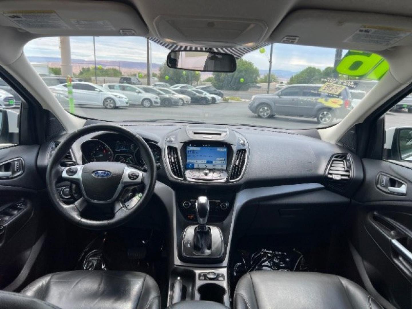 2016 Oxford White /Charcoal Black Ford Escape SE (1FMCU9GX3GU) , Automatic transmission, located at 1865 East Red Hills Pkwy, St. George, 84770, (435) 628-0023, 37.120850, -113.543640 - We specialize in helping ALL people get the best financing available. No matter your credit score, good, bad or none we can get you an amazing rate. Had a bankruptcy, divorce, or repossessions? We give you the green light to get your credit back on the road. Low down and affordable payments that fit- Photo#23