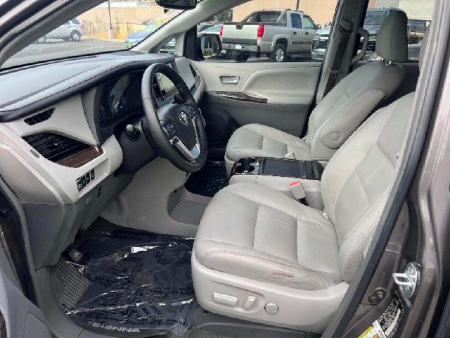 2016 Gray /Gray Cloth Interior Toyota Sienna XLE (5TDYK3DC4GS) with an 3.5L V-6 DOHC engine, Automatic transmission, located at 1865 East Red Hills Pkwy, St. George, 84770, (435) 628-0023, 37.120850, -113.543640 - We specialize in helping ALL people get the best financing available. No matter your credit score, good, bad or none we can get you an amazing rate. Had a bankruptcy, divorce, or repossessions? We give you the green light to get your credit back on the road. Low down and affordable payments that fit- Photo#14