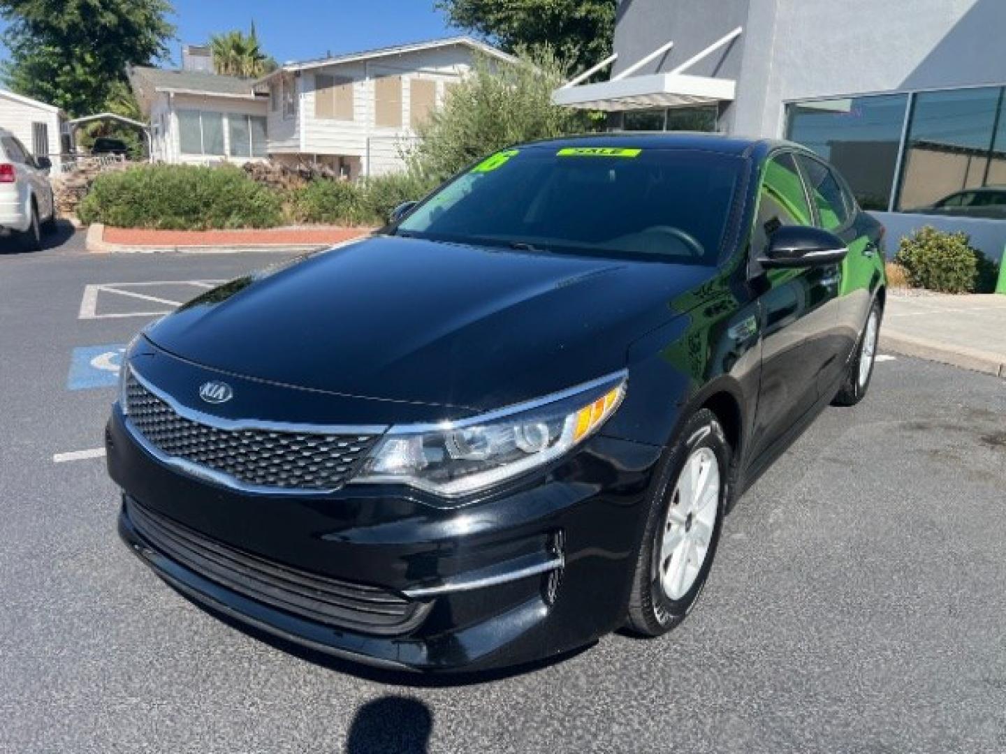 2016 Ebony Black /Black Kia Optima LX (5XXGT4L39GG) with an Theta II 2.4L I-4 gasoline direct injection engine, Automatic transmission, located at 1865 East Red Hills Pkwy, St. George, 84770, (435) 628-0023, 37.120850, -113.543640- Photo#2