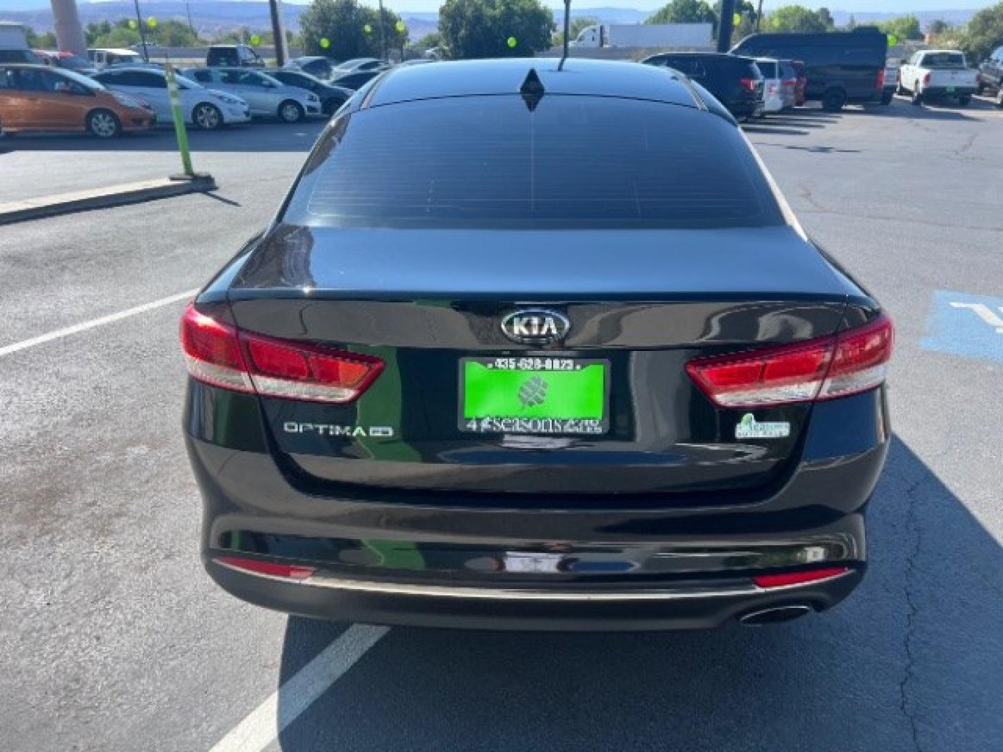 2016 Ebony Black /Black Kia Optima LX (5XXGT4L39GG) with an Theta II 2.4L I-4 gasoline direct injection engine, Automatic transmission, located at 1865 East Red Hills Pkwy, St. George, 84770, (435) 628-0023, 37.120850, -113.543640- Photo#5