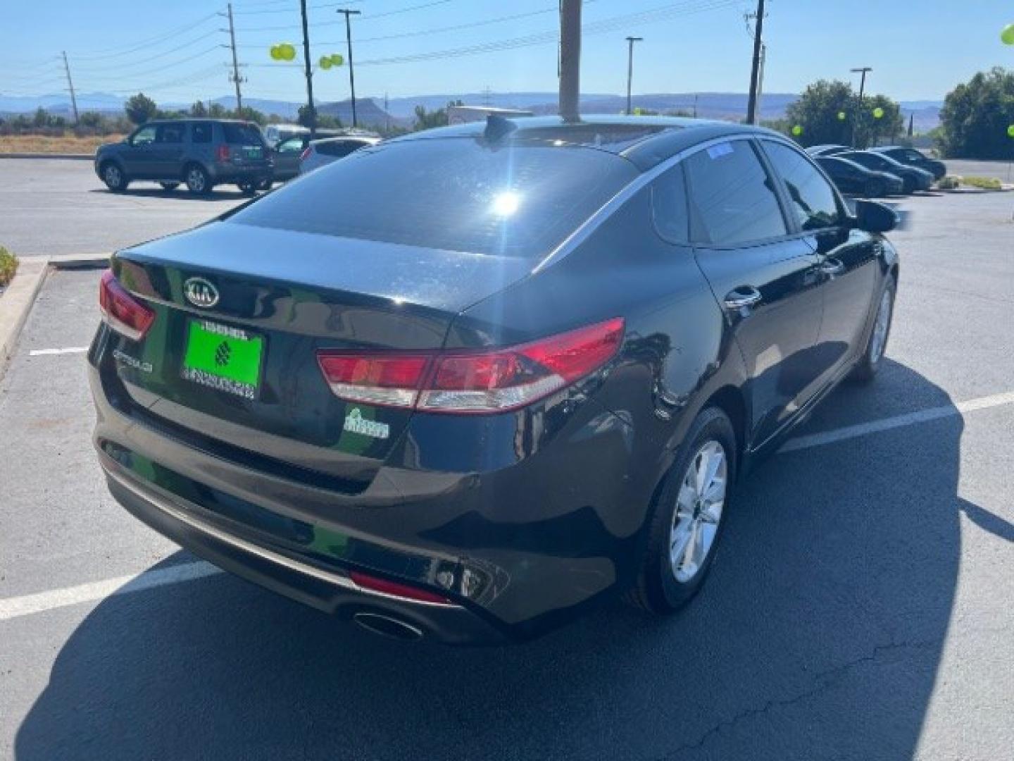 2016 Ebony Black /Black Kia Optima LX (5XXGT4L39GG) with an Theta II 2.4L I-4 gasoline direct injection engine, Automatic transmission, located at 1865 East Red Hills Pkwy, St. George, 84770, (435) 628-0023, 37.120850, -113.543640- Photo#6