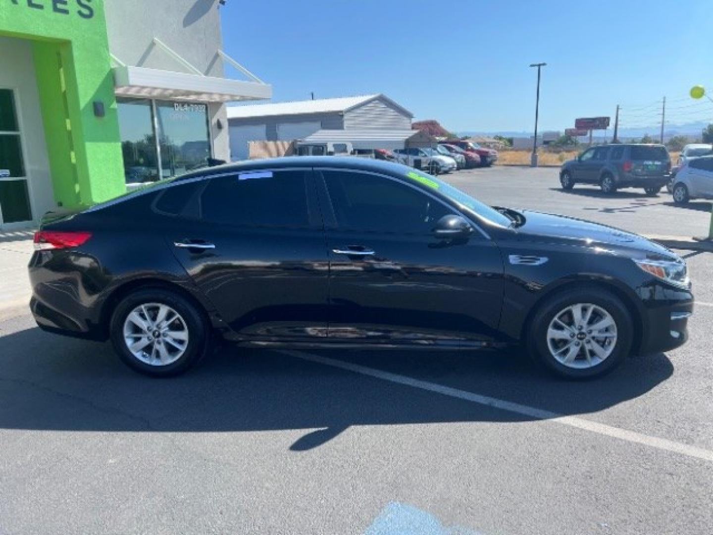 2016 Ebony Black /Black Kia Optima LX (5XXGT4L39GG) with an Theta II 2.4L I-4 gasoline direct injection engine, Automatic transmission, located at 1865 East Red Hills Pkwy, St. George, 84770, (435) 628-0023, 37.120850, -113.543640- Photo#7