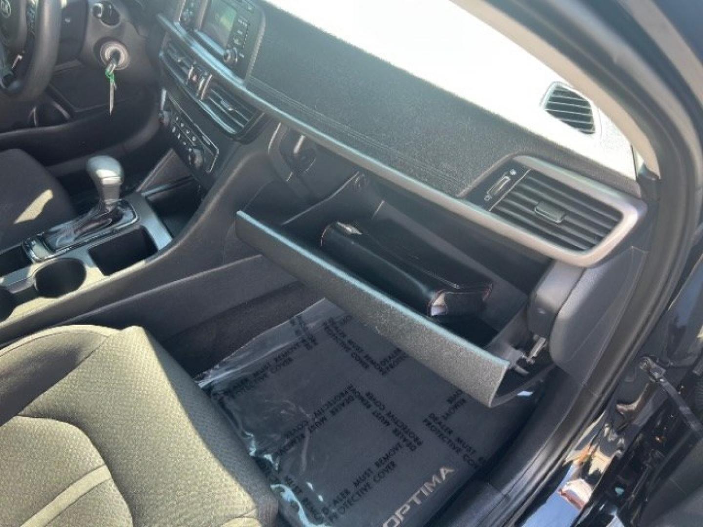 2016 Ebony Black /Black Kia Optima LX (5XXGT4L39GG) with an Theta II 2.4L I-4 gasoline direct injection engine, Automatic transmission, located at 1865 East Red Hills Pkwy, St. George, 84770, (435) 628-0023, 37.120850, -113.543640- Photo#29
