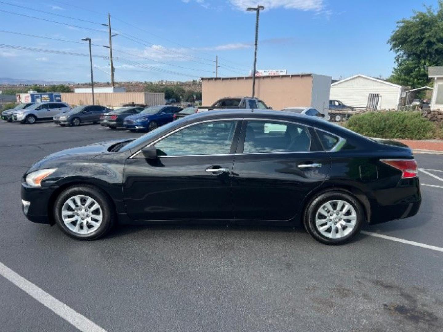 2015 Super Black /Charcoal Nissan Altima 2.5 S (1N4AL3AP1FC) with an 2.5L I-4 DOHC engine, Automatic transmission, located at 940 North Main Street, Cedar City, UT, 84720, (435) 628-0023, 37.692936, -113.061897 - Versatile Southern Utah travel starts with this 2015 Nissan Altima 2.5 S. Its 2.5L 4-cylinder engine, CVT automatic transmission, and front-wheel drive make it a smart fit for commuting, errands, and easy highway travel. With 73024 miles, this Altima is ready for its next adventure. The 2.5 S adds- Photo#3