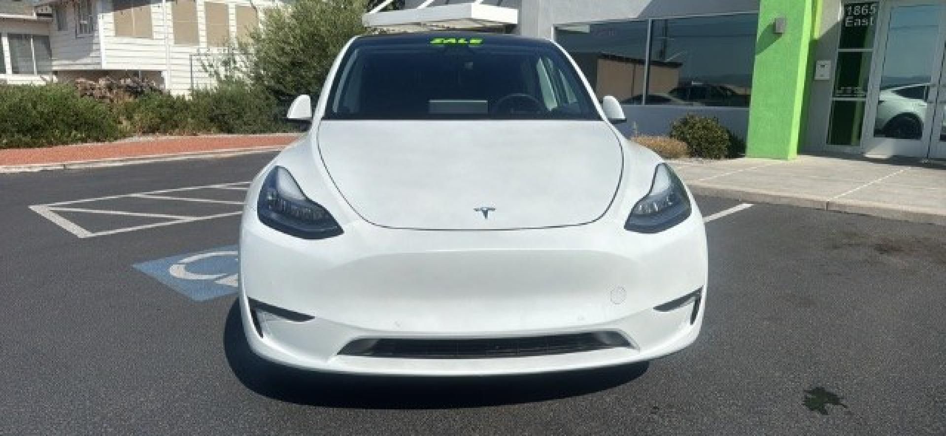 2020 Pearl White Multi-Coat /Black Tesla Model Y Long Range Dual Motor All-Wheel Drive (5YJYGDEEXLF) with an ELECTRIC engine, Electric transmission, located at 1865 East Red Hills Pkwy, St. George, 84770, (435) 628-0023, 37.120850, -113.543640 - Excellent Tesla Model Y Long Range All Wheel Drive, Acceleration Boost PAID FOR, 5 Seats HW3, Interior and exterior in great condition. Small scratches and dings as pictured. Every Tesla we sell has had cabin air filter replaced, radiator cleaned, fluids topped AND comes with a mobile charging kit- Photo#1