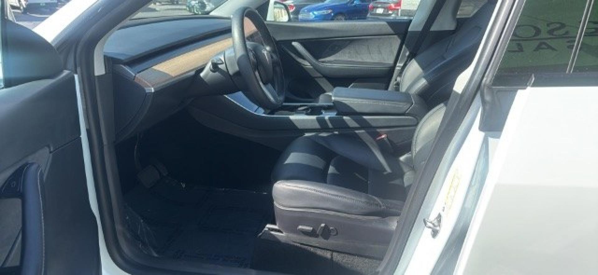 2020 Pearl White Multi-Coat /Black Tesla Model Y Long Range Dual Motor All-Wheel Drive (5YJYGDEEXLF) with an ELECTRIC engine, Electric transmission, located at 1865 East Red Hills Pkwy, St. George, 84770, (435) 628-0023, 37.120850, -113.543640 - Excellent Tesla Model Y Long Range All Wheel Drive, Acceleration Boost PAID FOR, 5 Seats HW3, Interior and exterior in great condition. Small scratches and dings as pictured. Every Tesla we sell has had cabin air filter replaced, radiator cleaned, fluids topped AND comes with a mobile charging kit- Photo#8