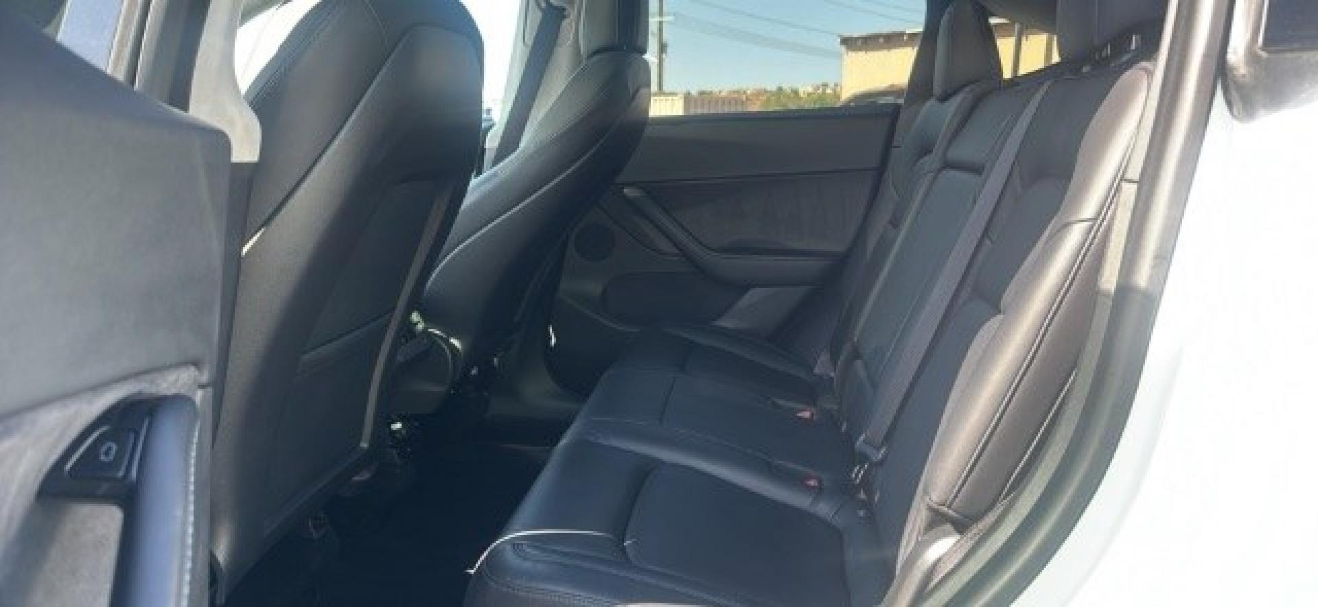 2020 Pearl White Multi-Coat /Black Tesla Model Y Long Range Dual Motor All-Wheel Drive (5YJYGDEEXLF) with an ELECTRIC engine, Electric transmission, located at 1865 East Red Hills Pkwy, St. George, 84770, (435) 628-0023, 37.120850, -113.543640 - Excellent Tesla Model Y Long Range All Wheel Drive, Acceleration Boost PAID FOR, 5 Seats HW3, Interior and exterior in great condition. Small scratches and dings as pictured. Every Tesla we sell has had cabin air filter replaced, radiator cleaned, fluids topped AND comes with a mobile charging kit- Photo#9