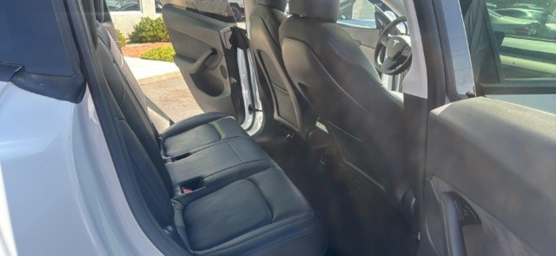 2020 Pearl White Multi-Coat /Black Tesla Model Y Long Range Dual Motor All-Wheel Drive (5YJYGDEEXLF) with an ELECTRIC engine, Electric transmission, located at 1865 East Red Hills Pkwy, St. George, 84770, (435) 628-0023, 37.120850, -113.543640 - Excellent Tesla Model Y Long Range All Wheel Drive, Acceleration Boost PAID FOR, 5 Seats HW3, Interior and exterior in great condition. Small scratches and dings as pictured. Every Tesla we sell has had cabin air filter replaced, radiator cleaned, fluids topped AND comes with a mobile charging kit- Photo#11