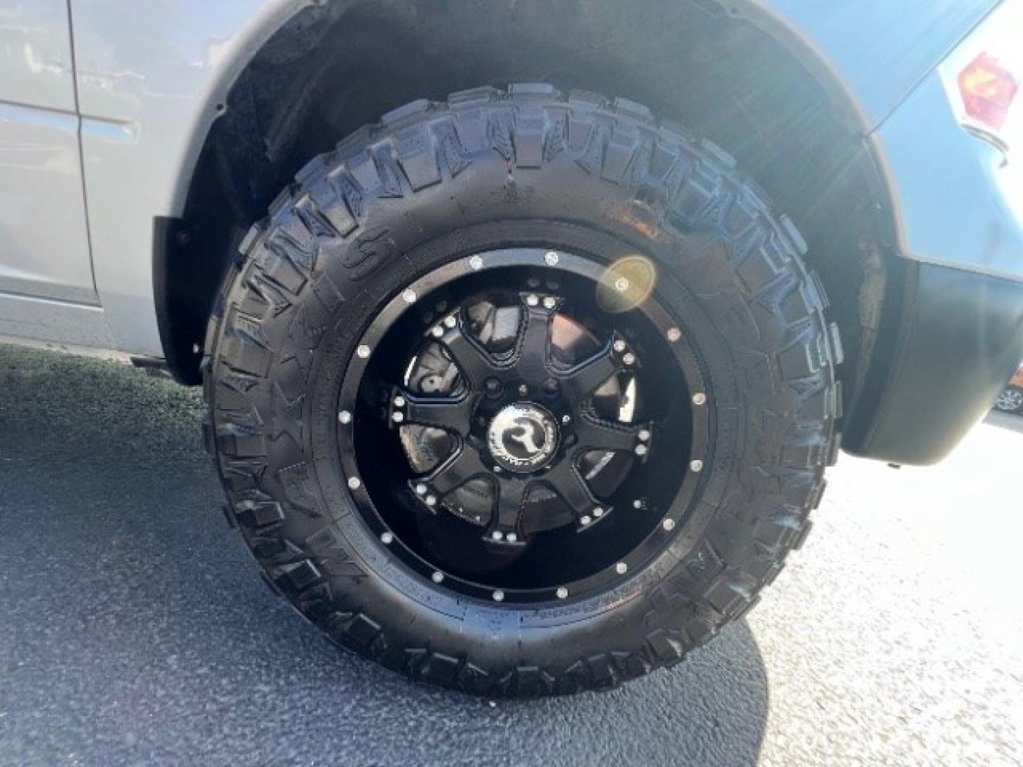 2018 Bright Silver Metallic Clearcoat /Diesel Gray/Black Ram 1500 Tradesman Quad Cab 4x4 6'4 Box (1C6RR7FG5JS) with an Pentastar 3.6L V-6 DOHC engine, Automatic transmission, located at 1865 East Red Hills Pkwy, St. George, 84770, (435) 628-0023, 37.120850, -113.543640 - We specialize in helping ALL people get the best financing available. No matter your credit score, good, bad or none we can get you an amazing rate. Had a bankruptcy, divorce, or repossessions? We give you the green light to get your credit back on the road. Low down and affordable payments that fit- Photo#10
