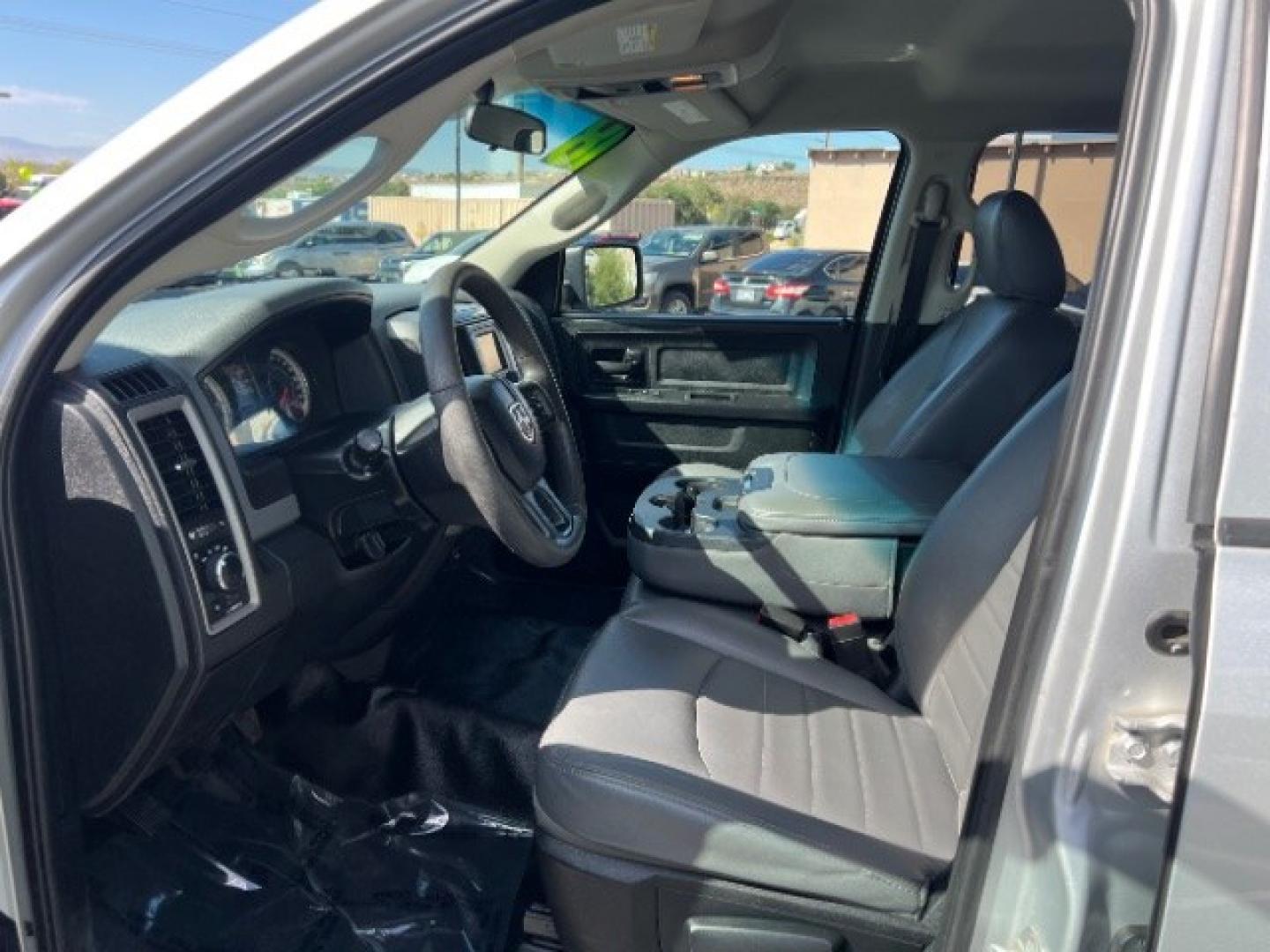 2018 Bright Silver Metallic Clearcoat /Diesel Gray/Black Ram 1500 Tradesman Quad Cab 4x4 6'4 Box (1C6RR7FG5JS) with an Pentastar 3.6L V-6 DOHC engine, Automatic transmission, located at 1865 East Red Hills Pkwy, St. George, 84770, (435) 628-0023, 37.120850, -113.543640 - We specialize in helping ALL people get the best financing available. No matter your credit score, good, bad or none we can get you an amazing rate. Had a bankruptcy, divorce, or repossessions? We give you the green light to get your credit back on the road. Low down and affordable payments that fit- Photo#14
