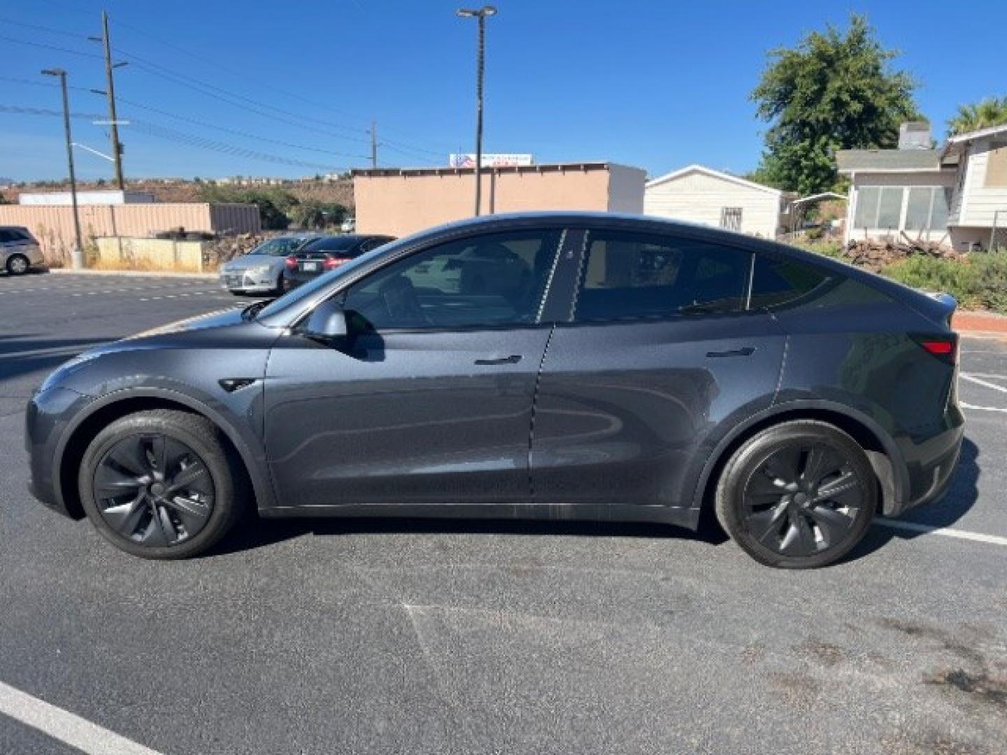 2024 Stealth Grey /Black Tesla Model Y Long Range Dual Motor All-Wheel Drive (7SAYGAEE8RF) with an ELECTRIC engine, Electric transmission, located at 1865 East Red Hills Pkwy, St. George, 84770, (435) 628-0023, 37.120850, -113.543640 - Excellent Tesla Model Y Long Range All Wheel Drive , 7 Seats HW4!, Interior and exterior in great condition. Small scratches and dings as pictured. Every Tesla we sell has had cabin air filter replaced, radiator cleaned, fluids topped AND comes with a mobile charging kit! Battery is healthy and ge- Photo#5