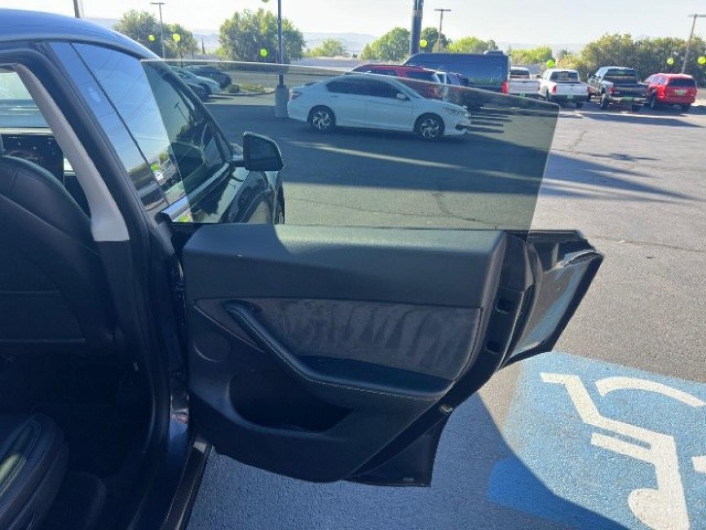 2024 Stealth Grey /Black Tesla Model Y Long Range Dual Motor All-Wheel Drive (7SAYGAEE8RF) with an ELECTRIC engine, Electric transmission, located at 1865 East Red Hills Pkwy, St. George, 84770, (435) 628-0023, 37.120850, -113.543640 - Excellent Tesla Model Y Long Range All Wheel Drive , 7 Seats HW4!, Interior and exterior in great condition. Small scratches and dings as pictured. Every Tesla we sell has had cabin air filter replaced, radiator cleaned, fluids topped AND comes with a mobile charging kit! Battery is healthy and ge- Photo#23