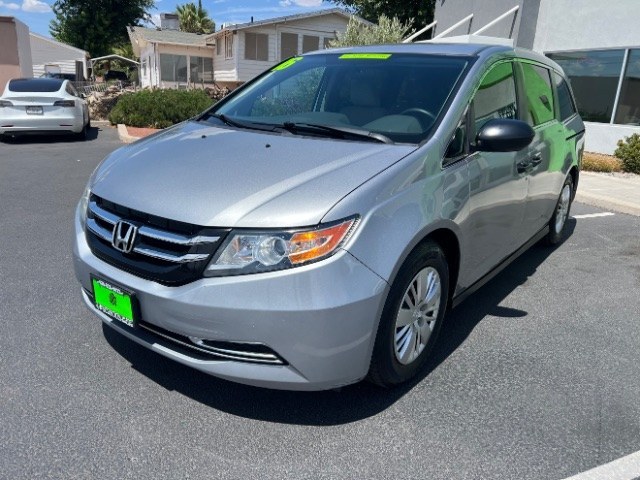 2016 Lunar Silver Metallic /Truffle Honda Odyssey LX (5FNRL5H24GB) with an 3.5L V-6 i-VTEC variable valve control engine, Automatic transmission, located at 940 North Main Street, Cedar City, UT, 84720, (435) 628-0023, 37.692936, -113.061897 - We specialize in helping ALL people get the best financing available. No matter your credit score, good, bad or none we can get you an amazing rate. Had a bankruptcy, divorce, or repossessions? We give you the green light to get your credit back on the road. Low down and affordable payments that fit- Photo#2