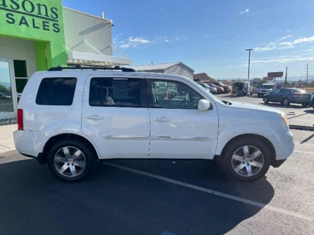 2013 White Diamond Pearl /Gray Honda Pilot Touring (5FNYF4H92DB) with an 3.5L V-6 i-VTEC VCM variable valve control engine, Automatic transmission, located at 940 North Main Street, Cedar City, UT, 84720, (435) 628-0023, 37.692936, -113.061897 - We specialize in helping ALL people get the best financing available. No matter your credit score, good, bad or none we can get you an amazing rate. Had a bankruptcy, divorce, or repossessions? We give you the green light to get your credit back on the road. Low down and affordable payments that fit- Photo#7