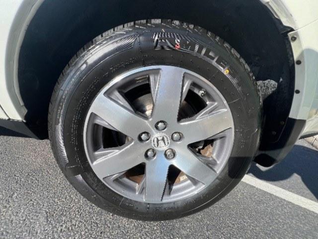 2013 White Diamond Pearl /Gray Honda Pilot Touring (5FNYF4H92DB) with an 3.5L V-6 i-VTEC VCM variable valve control engine, Automatic transmission, located at 940 North Main Street, Cedar City, UT, 84720, (435) 628-0023, 37.692936, -113.061897 - We specialize in helping ALL people get the best financing available. No matter your credit score, good, bad or none we can get you an amazing rate. Had a bankruptcy, divorce, or repossessions? We give you the green light to get your credit back on the road. Low down and affordable payments that fit- Photo#10