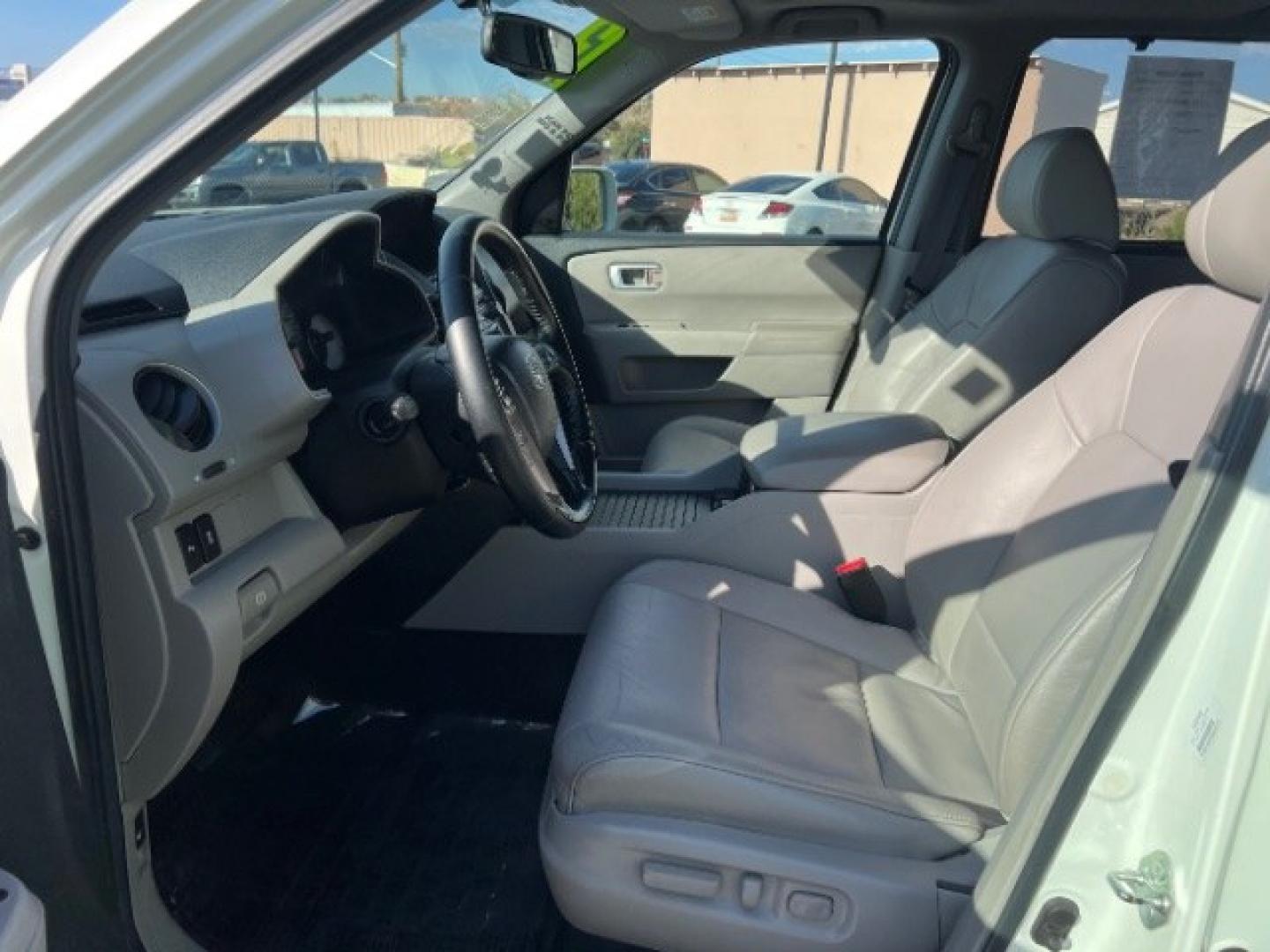 2013 White Diamond Pearl /Gray Honda Pilot Touring (5FNYF4H92DB) with an 3.5L V-6 i-VTEC VCM variable valve control engine, Automatic transmission, located at 940 North Main Street, Cedar City, UT, 84720, (435) 628-0023, 37.692936, -113.061897 - We specialize in helping ALL people get the best financing available. No matter your credit score, good, bad or none we can get you an amazing rate. Had a bankruptcy, divorce, or repossessions? We give you the green light to get your credit back on the road. Low down and affordable payments that fit- Photo#14