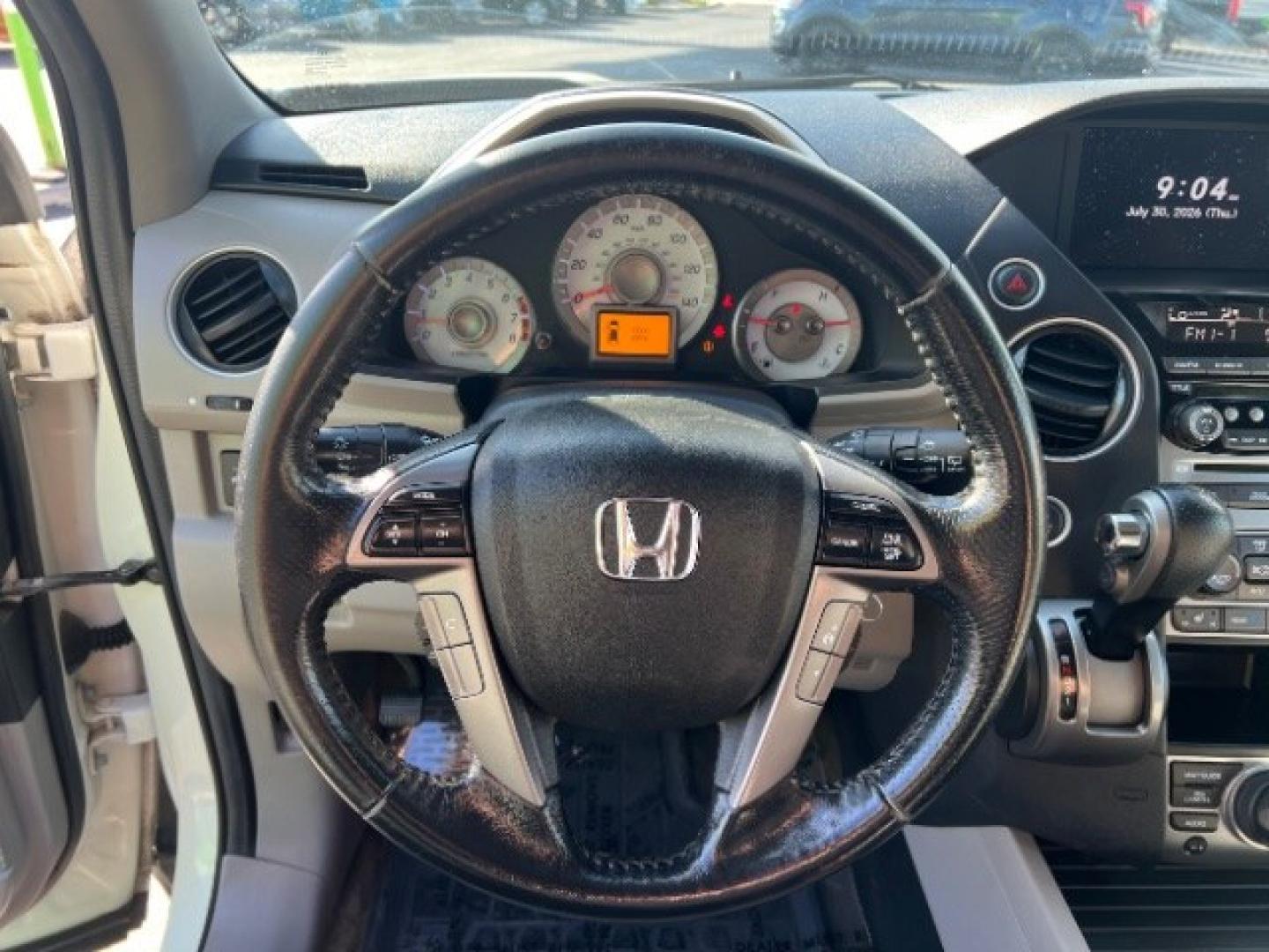2013 White Diamond Pearl /Gray Honda Pilot Touring (5FNYF4H92DB) with an 3.5L V-6 i-VTEC VCM variable valve control engine, Automatic transmission, located at 940 North Main Street, Cedar City, UT, 84720, (435) 628-0023, 37.692936, -113.061897 - We specialize in helping ALL people get the best financing available. No matter your credit score, good, bad or none we can get you an amazing rate. Had a bankruptcy, divorce, or repossessions? We give you the green light to get your credit back on the road. Low down and affordable payments that fit- Photo#15