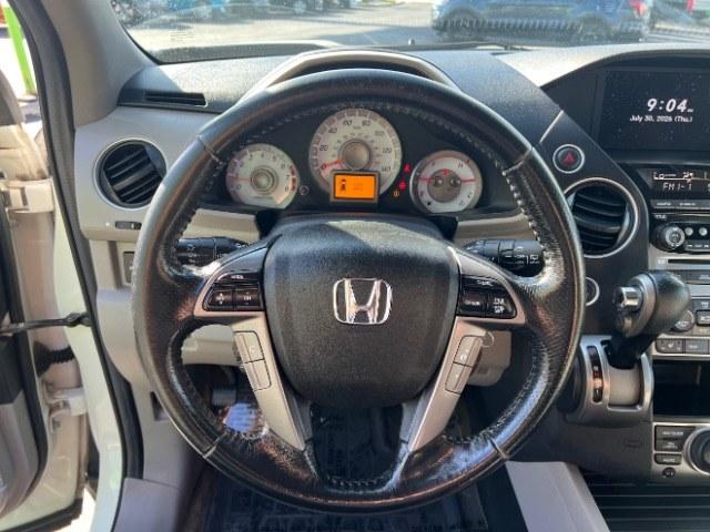 2013 White Diamond Pearl /Gray Honda Pilot Touring (5FNYF4H92DB) with an 3.5L V-6 i-VTEC VCM variable valve control engine, Automatic transmission, located at 940 North Main Street, Cedar City, UT, 84720, (435) 628-0023, 37.692936, -113.061897 - We specialize in helping ALL people get the best financing available. No matter your credit score, good, bad or none we can get you an amazing rate. Had a bankruptcy, divorce, or repossessions? We give you the green light to get your credit back on the road. Low down and affordable payments that fit- Photo#15