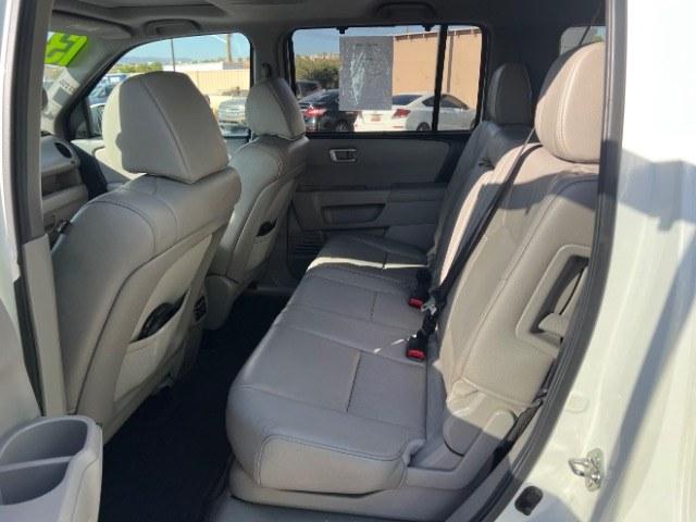 2013 White Diamond Pearl /Gray Honda Pilot Touring (5FNYF4H92DB) with an 3.5L V-6 i-VTEC VCM variable valve control engine, Automatic transmission, located at 940 North Main Street, Cedar City, UT, 84720, (435) 628-0023, 37.692936, -113.061897 - We specialize in helping ALL people get the best financing available. No matter your credit score, good, bad or none we can get you an amazing rate. Had a bankruptcy, divorce, or repossessions? We give you the green light to get your credit back on the road. Low down and affordable payments that fit- Photo#21