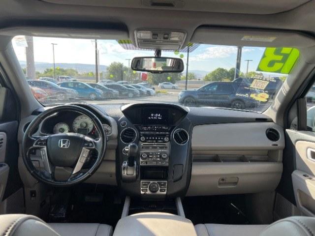 2013 White Diamond Pearl /Gray Honda Pilot Touring (5FNYF4H92DB) with an 3.5L V-6 i-VTEC VCM variable valve control engine, Automatic transmission, located at 940 North Main Street, Cedar City, UT, 84720, (435) 628-0023, 37.692936, -113.061897 - We specialize in helping ALL people get the best financing available. No matter your credit score, good, bad or none we can get you an amazing rate. Had a bankruptcy, divorce, or repossessions? We give you the green light to get your credit back on the road. Low down and affordable payments that fit- Photo#23