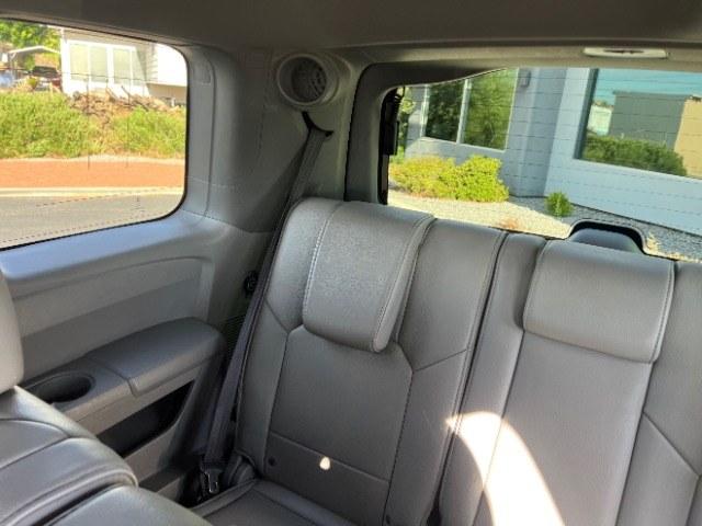 2013 White Diamond Pearl /Gray Honda Pilot Touring (5FNYF4H92DB) with an 3.5L V-6 i-VTEC VCM variable valve control engine, Automatic transmission, located at 940 North Main Street, Cedar City, UT, 84720, (435) 628-0023, 37.692936, -113.061897 - We specialize in helping ALL people get the best financing available. No matter your credit score, good, bad or none we can get you an amazing rate. Had a bankruptcy, divorce, or repossessions? We give you the green light to get your credit back on the road. Low down and affordable payments that fit- Photo#27