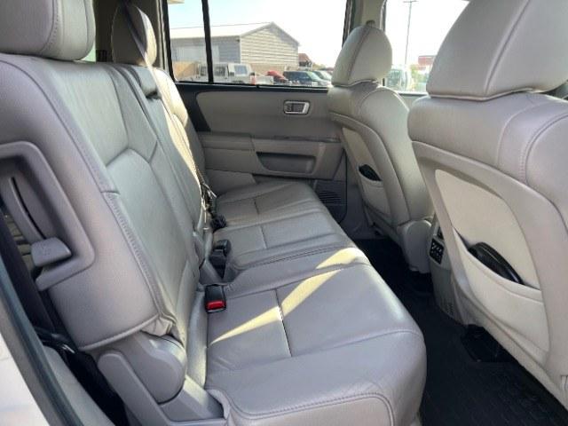 2013 White Diamond Pearl /Gray Honda Pilot Touring (5FNYF4H92DB) with an 3.5L V-6 i-VTEC VCM variable valve control engine, Automatic transmission, located at 940 North Main Street, Cedar City, UT, 84720, (435) 628-0023, 37.692936, -113.061897 - We specialize in helping ALL people get the best financing available. No matter your credit score, good, bad or none we can get you an amazing rate. Had a bankruptcy, divorce, or repossessions? We give you the green light to get your credit back on the road. Low down and affordable payments that fit- Photo#30
