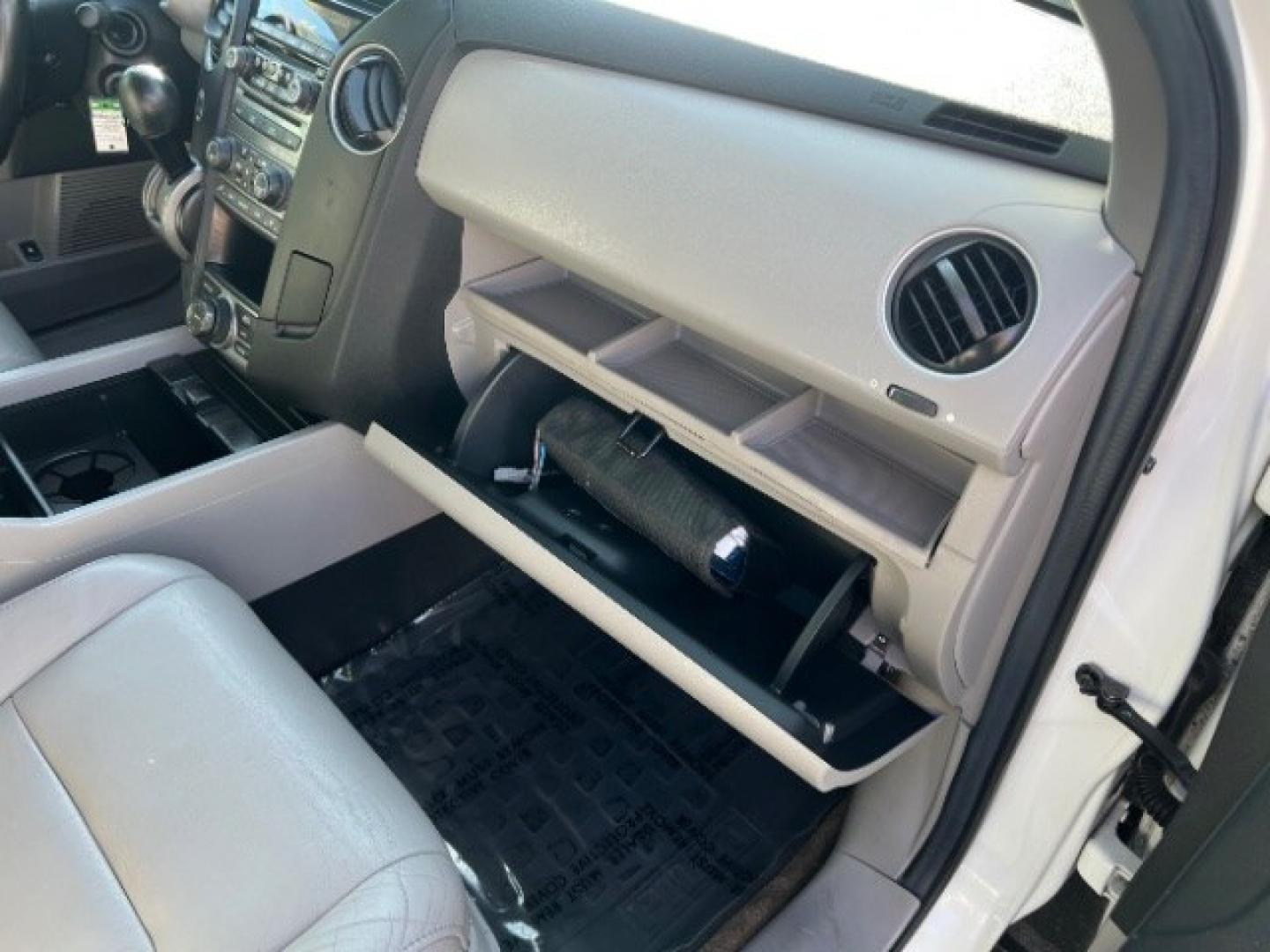 2013 White Diamond Pearl /Gray Honda Pilot Touring (5FNYF4H92DB) with an 3.5L V-6 i-VTEC VCM variable valve control engine, Automatic transmission, located at 940 North Main Street, Cedar City, UT, 84720, (435) 628-0023, 37.692936, -113.061897 - We specialize in helping ALL people get the best financing available. No matter your credit score, good, bad or none we can get you an amazing rate. Had a bankruptcy, divorce, or repossessions? We give you the green light to get your credit back on the road. Low down and affordable payments that fit- Photo#33