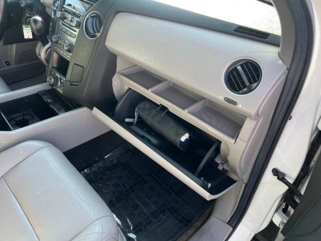 2013 White Diamond Pearl /Gray Honda Pilot Touring (5FNYF4H92DB) with an 3.5L V-6 i-VTEC VCM variable valve control engine, Automatic transmission, located at 940 North Main Street, Cedar City, UT, 84720, (435) 628-0023, 37.692936, -113.061897 - We specialize in helping ALL people get the best financing available. No matter your credit score, good, bad or none we can get you an amazing rate. Had a bankruptcy, divorce, or repossessions? We give you the green light to get your credit back on the road. Low down and affordable payments that fit- Photo#33