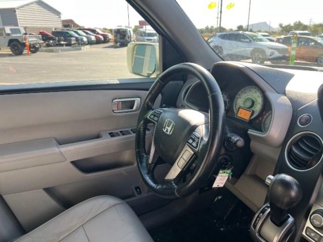 2013 White Diamond Pearl /Gray Honda Pilot Touring (5FNYF4H92DB) with an 3.5L V-6 i-VTEC VCM variable valve control engine, Automatic transmission, located at 940 North Main Street, Cedar City, UT, 84720, (435) 628-0023, 37.692936, -113.061897 - We specialize in helping ALL people get the best financing available. No matter your credit score, good, bad or none we can get you an amazing rate. Had a bankruptcy, divorce, or repossessions? We give you the green light to get your credit back on the road. Low down and affordable payments that fit- Photo#34