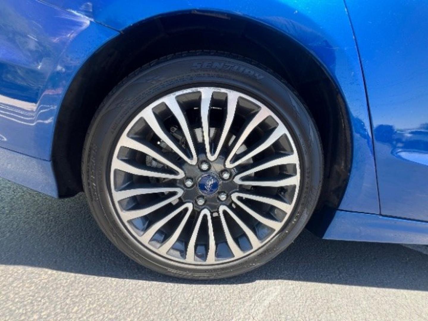 2017 Lightning Blue /Medium Soft Ceramic Ford Fusion Hybrid Titanium (3FA6P0RU8HR) with an 2L I-4 DOHC engine, Automatic transmission, located at 1865 East Red Hills Pkwy, St. George, 84770, (435) 628-0023, 37.120850, -113.543640 - We specialize in helping ALL people get the best financing available. No matter your credit score, good, bad or none we can get you an amazing rate. Had a bankruptcy, divorce, or repossessions? We give you the green light to get your credit back on the road. Low down and affordable payments that fit- Photo#11
