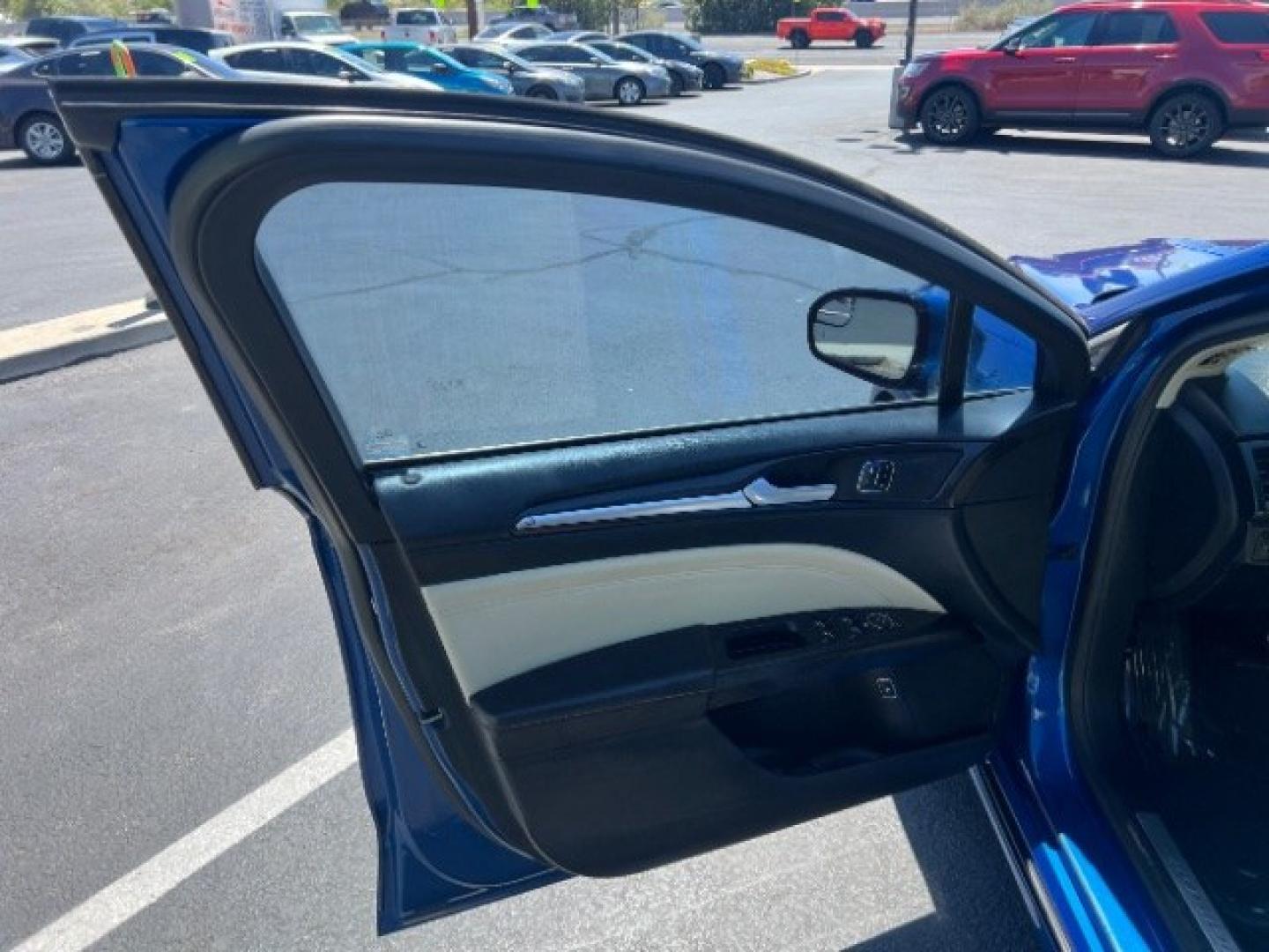 2017 Lightning Blue /Medium Soft Ceramic Ford Fusion Hybrid Titanium (3FA6P0RU8HR) with an 2L I-4 DOHC engine, Automatic transmission, located at 1865 East Red Hills Pkwy, St. George, 84770, (435) 628-0023, 37.120850, -113.543640 - We specialize in helping ALL people get the best financing available. No matter your credit score, good, bad or none we can get you an amazing rate. Had a bankruptcy, divorce, or repossessions? We give you the green light to get your credit back on the road. Low down and affordable payments that fit- Photo#12