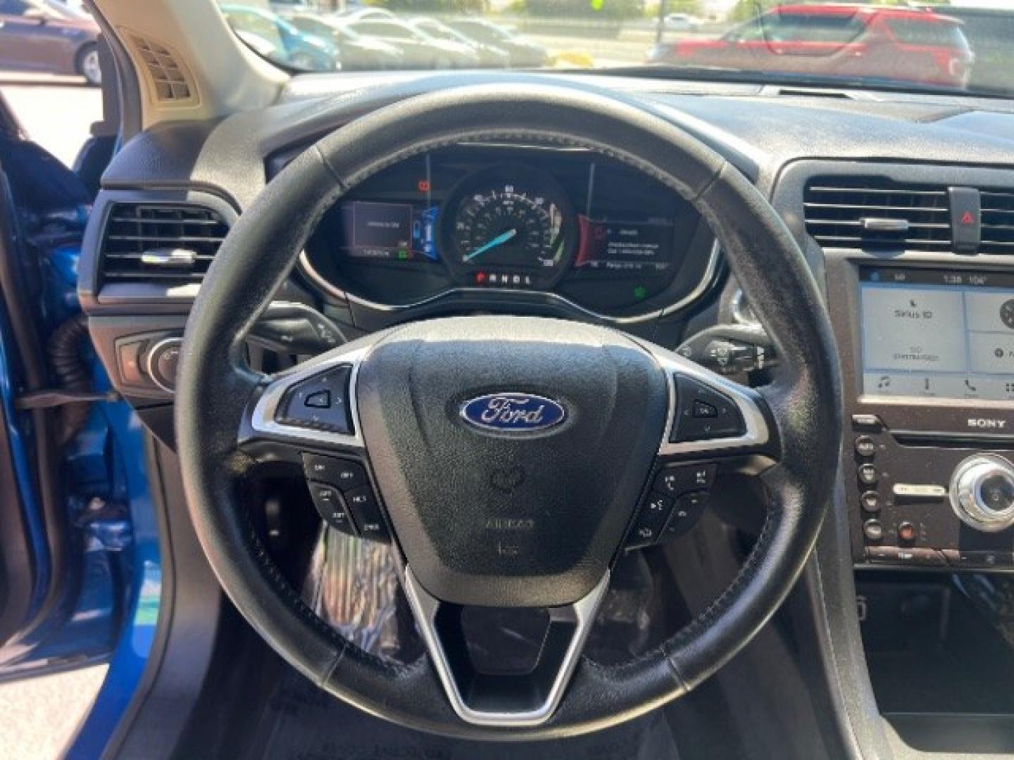 2017 Lightning Blue /Medium Soft Ceramic Ford Fusion Hybrid Titanium (3FA6P0RU8HR) with an 2L I-4 DOHC engine, Automatic transmission, located at 1865 East Red Hills Pkwy, St. George, 84770, (435) 628-0023, 37.120850, -113.543640 - We specialize in helping ALL people get the best financing available. No matter your credit score, good, bad or none we can get you an amazing rate. Had a bankruptcy, divorce, or repossessions? We give you the green light to get your credit back on the road. Low down and affordable payments that fit- Photo#15