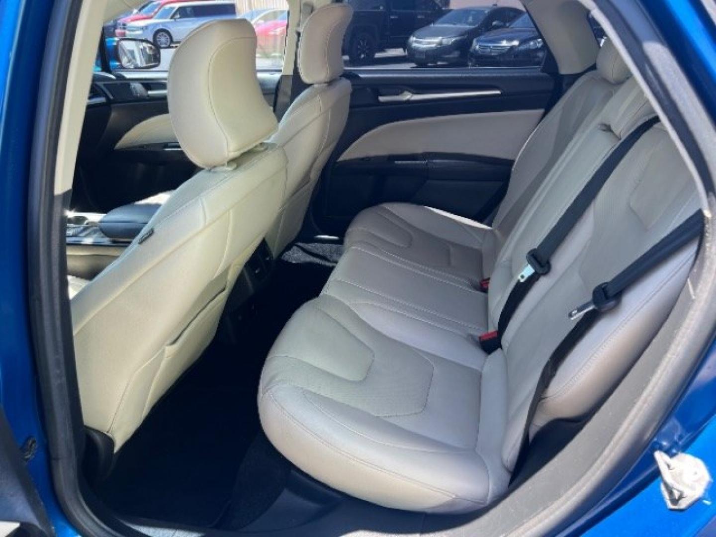 2017 Lightning Blue /Medium Soft Ceramic Ford Fusion Hybrid Titanium (3FA6P0RU8HR) with an 2L I-4 DOHC engine, Automatic transmission, located at 1865 East Red Hills Pkwy, St. George, 84770, (435) 628-0023, 37.120850, -113.543640 - We specialize in helping ALL people get the best financing available. No matter your credit score, good, bad or none we can get you an amazing rate. Had a bankruptcy, divorce, or repossessions? We give you the green light to get your credit back on the road. Low down and affordable payments that fit- Photo#20