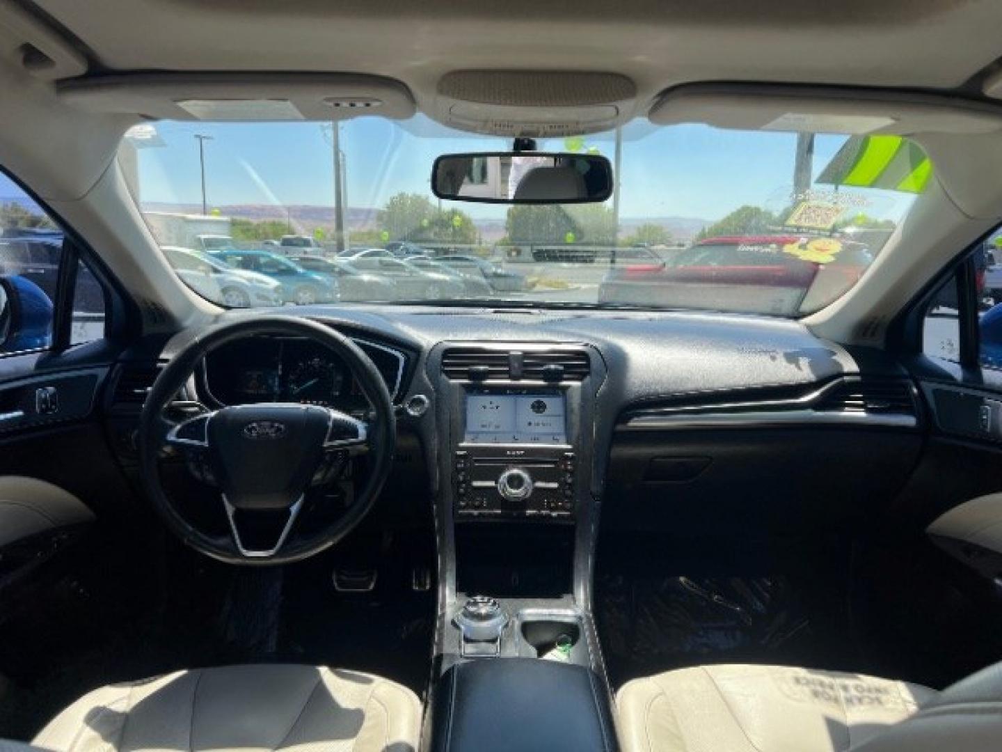 2017 Lightning Blue /Medium Soft Ceramic Ford Fusion Hybrid Titanium (3FA6P0RU8HR) with an 2L I-4 DOHC engine, Automatic transmission, located at 1865 East Red Hills Pkwy, St. George, 84770, (435) 628-0023, 37.120850, -113.543640 - We specialize in helping ALL people get the best financing available. No matter your credit score, good, bad or none we can get you an amazing rate. Had a bankruptcy, divorce, or repossessions? We give you the green light to get your credit back on the road. Low down and affordable payments that fit- Photo#22