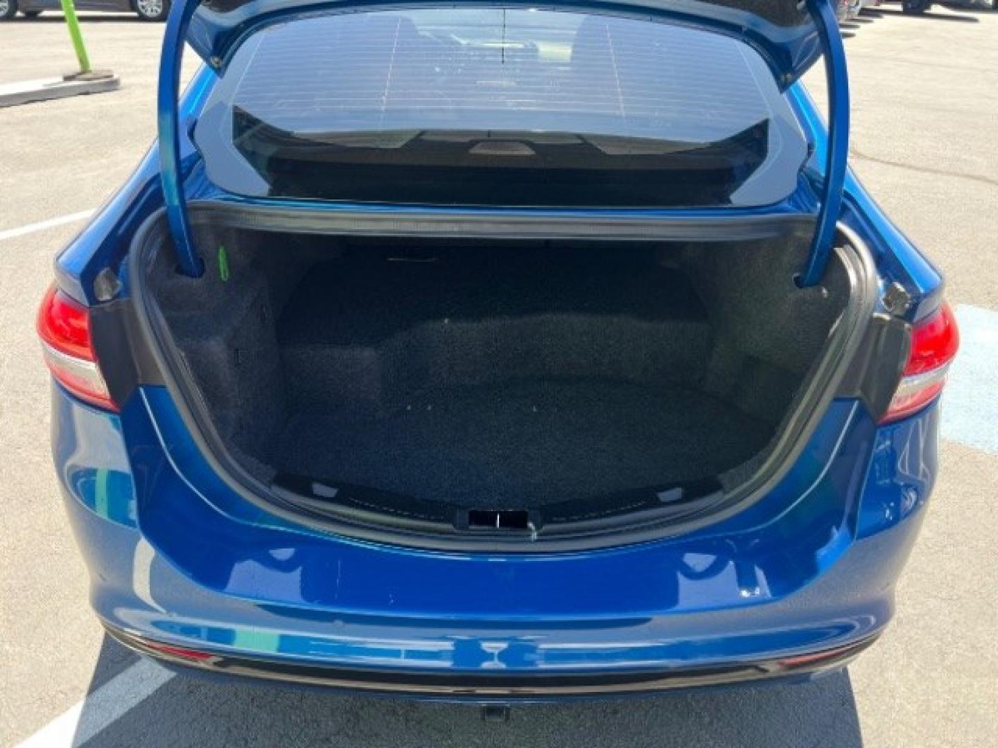 2017 Lightning Blue /Medium Soft Ceramic Ford Fusion Hybrid Titanium (3FA6P0RU8HR) with an 2L I-4 DOHC engine, Automatic transmission, located at 1865 East Red Hills Pkwy, St. George, 84770, (435) 628-0023, 37.120850, -113.543640 - We specialize in helping ALL people get the best financing available. No matter your credit score, good, bad or none we can get you an amazing rate. Had a bankruptcy, divorce, or repossessions? We give you the green light to get your credit back on the road. Low down and affordable payments that fit- Photo#23