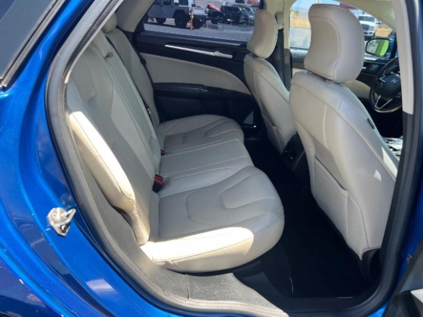 2017 Lightning Blue /Medium Soft Ceramic Ford Fusion Hybrid Titanium (3FA6P0RU8HR) with an 2L I-4 DOHC engine, Automatic transmission, located at 1865 East Red Hills Pkwy, St. George, 84770, (435) 628-0023, 37.120850, -113.543640 - We specialize in helping ALL people get the best financing available. No matter your credit score, good, bad or none we can get you an amazing rate. Had a bankruptcy, divorce, or repossessions? We give you the green light to get your credit back on the road. Low down and affordable payments that fit- Photo#25