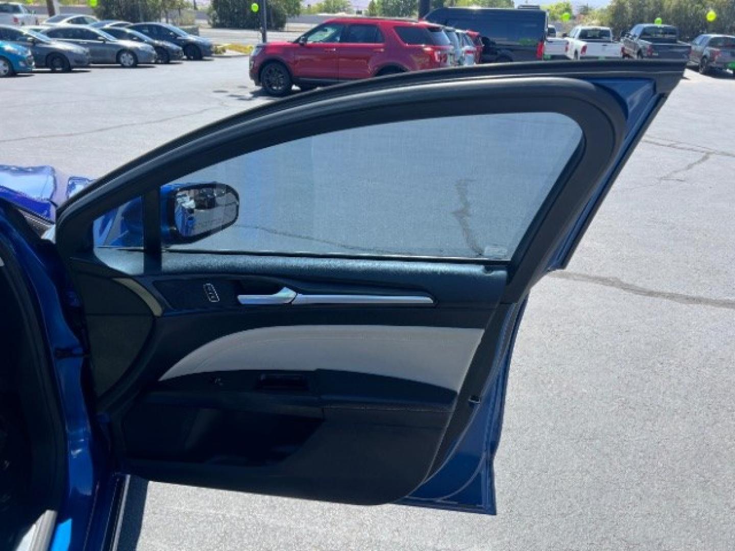 2017 Lightning Blue /Medium Soft Ceramic Ford Fusion Hybrid Titanium (3FA6P0RU8HR) with an 2L I-4 DOHC engine, Automatic transmission, located at 1865 East Red Hills Pkwy, St. George, 84770, (435) 628-0023, 37.120850, -113.543640 - We specialize in helping ALL people get the best financing available. No matter your credit score, good, bad or none we can get you an amazing rate. Had a bankruptcy, divorce, or repossessions? We give you the green light to get your credit back on the road. Low down and affordable payments that fit- Photo#26