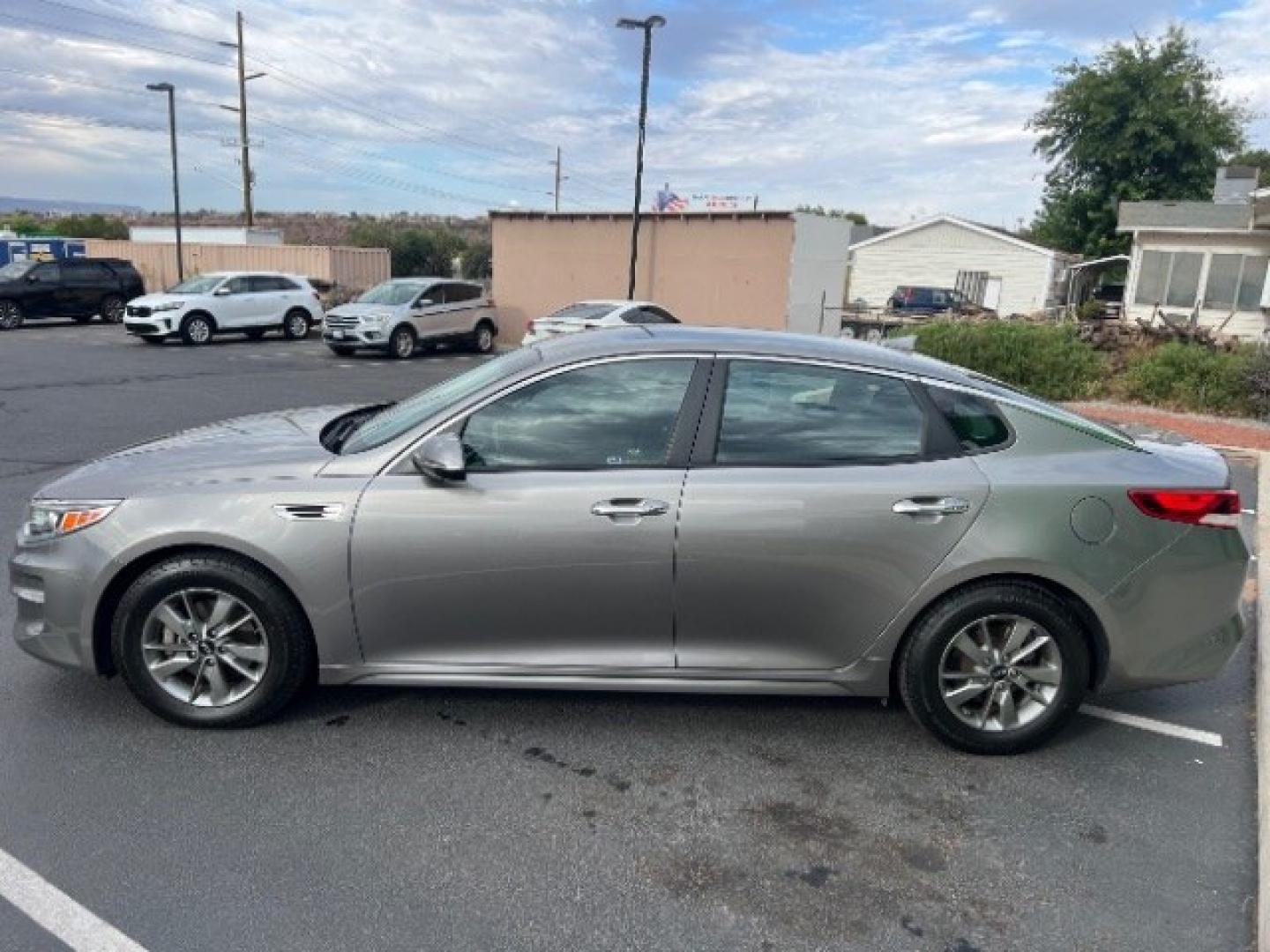 2017 Titanium Silver /Black Kia Optima LX Turbo (5XXGT4L12HG) with an 1.6L I-4 gasoline direct injection engine, Automatic transmission, located at 1865 East Red Hills Pkwy, St. George, 84770, (435) 628-0023, 37.120850, -113.543640 - We specialize in helping ALL people get the best financing available. No matter your credit score, good, bad or none we can get you an amazing rate. Had a bankruptcy, divorce, or repossessions? We give you the green light to get your credit back on the road. Low down and affordable payments that fit- Photo#3