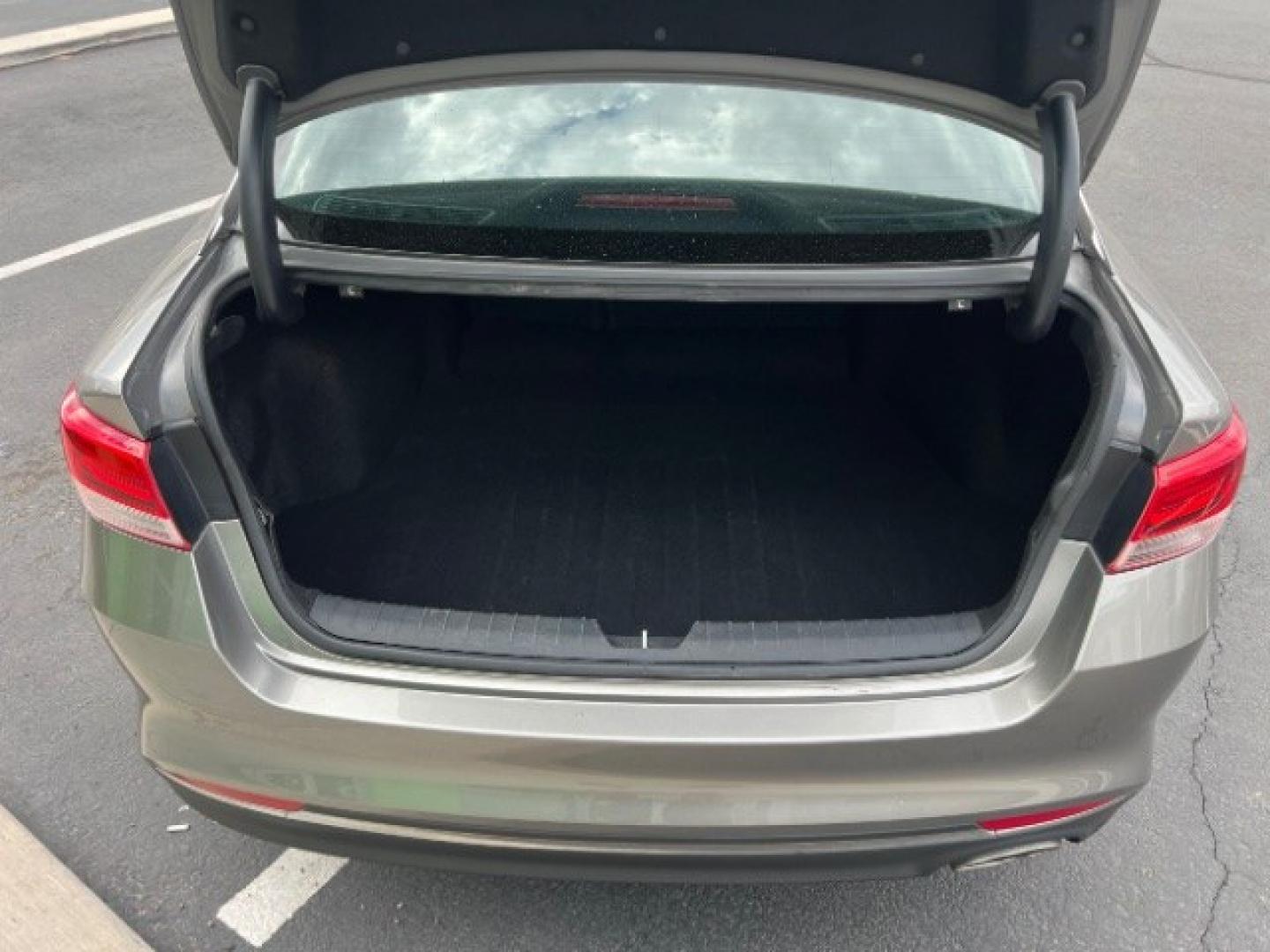 2017 Titanium Silver /Black Kia Optima LX Turbo (5XXGT4L12HG) with an 1.6L I-4 gasoline direct injection engine, Automatic transmission, located at 1865 East Red Hills Pkwy, St. George, 84770, (435) 628-0023, 37.120850, -113.543640 - We specialize in helping ALL people get the best financing available. No matter your credit score, good, bad or none we can get you an amazing rate. Had a bankruptcy, divorce, or repossessions? We give you the green light to get your credit back on the road. Low down and affordable payments that fit- Photo#24