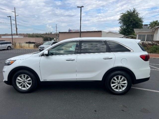 2019 Snow White Pearl /Stone Beige Kia Sorento 3.3L LX (5XYPGDA59KG) with an Lambda II 3.3L V-6 gasoline direct injection engine, AUTOMATIC transmission, located at 940 North Main Street, Cedar City, UT, 84720, (435) 628-0023, 37.692936, -113.061897 - This 2019 Kia Sorento LX is $11,000 in Cedar City. Mileage on the card is 118,379. Listed sales price includes $300 doc fee. 4 REASONS TO BUY FROM 4 SEASONS ~~CERTIFIED PREOWNED - This vehicle has gone through a 50 point inspection and road test. We fixed everything that was broken or worn out. O- Photo#3