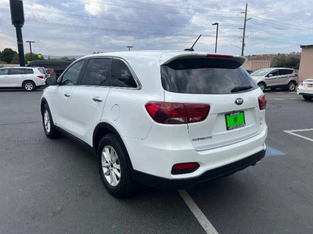 2019 Snow White Pearl /Stone Beige Kia Sorento 3.3L LX (5XYPGDA59KG) with an Lambda II 3.3L V-6 gasoline direct injection engine, AUTOMATIC transmission, located at 940 North Main Street, Cedar City, UT, 84720, (435) 628-0023, 37.692936, -113.061897 - This 2019 Kia Sorento LX is $11,000 in Cedar City. Mileage on the card is 118,379. Listed sales price includes $300 doc fee. 4 REASONS TO BUY FROM 4 SEASONS ~~CERTIFIED PREOWNED - This vehicle has gone through a 50 point inspection and road test. We fixed everything that was broken or worn out. O- Photo#4