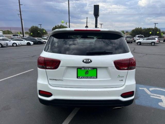 2019 Snow White Pearl /Stone Beige Kia Sorento 3.3L LX (5XYPGDA59KG) with an Lambda II 3.3L V-6 gasoline direct injection engine, AUTOMATIC transmission, located at 940 North Main Street, Cedar City, UT, 84720, (435) 628-0023, 37.692936, -113.061897 - This 2019 Kia Sorento LX is $11,000 in Cedar City. Mileage on the card is 118,379. Listed sales price includes $300 doc fee. 4 REASONS TO BUY FROM 4 SEASONS ~~CERTIFIED PREOWNED - This vehicle has gone through a 50 point inspection and road test. We fixed everything that was broken or worn out. O- Photo#5