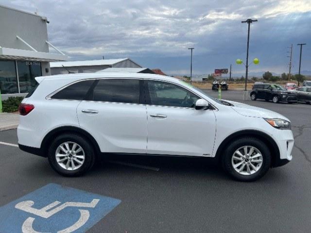 2019 Snow White Pearl /Stone Beige Kia Sorento 3.3L LX (5XYPGDA59KG) with an Lambda II 3.3L V-6 gasoline direct injection engine, AUTOMATIC transmission, located at 940 North Main Street, Cedar City, UT, 84720, (435) 628-0023, 37.692936, -113.061897 - This 2019 Kia Sorento LX is $11,000 in Cedar City. Mileage on the card is 118,379. Listed sales price includes $300 doc fee. 4 REASONS TO BUY FROM 4 SEASONS ~~CERTIFIED PREOWNED - This vehicle has gone through a 50 point inspection and road test. We fixed everything that was broken or worn out. O- Photo#7