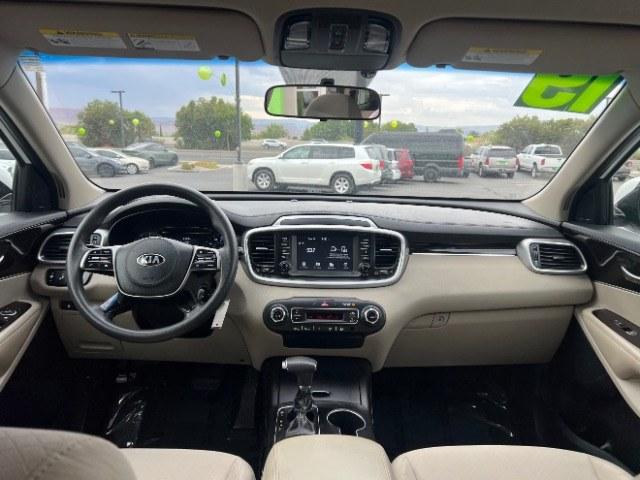 2019 Snow White Pearl /Stone Beige Kia Sorento 3.3L LX (5XYPGDA59KG) with an Lambda II 3.3L V-6 gasoline direct injection engine, AUTOMATIC transmission, located at 940 North Main Street, Cedar City, UT, 84720, (435) 628-0023, 37.692936, -113.061897 - This 2019 Kia Sorento LX is $11,000 in Cedar City. Mileage on the card is 118,379. Listed sales price includes $300 doc fee. 4 REASONS TO BUY FROM 4 SEASONS ~~CERTIFIED PREOWNED - This vehicle has gone through a 50 point inspection and road test. We fixed everything that was broken or worn out. O- Photo#23